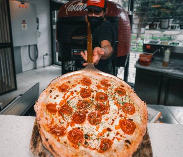 Pide tu pizza con 20% de descuento exclusivo para la Familia MINI.